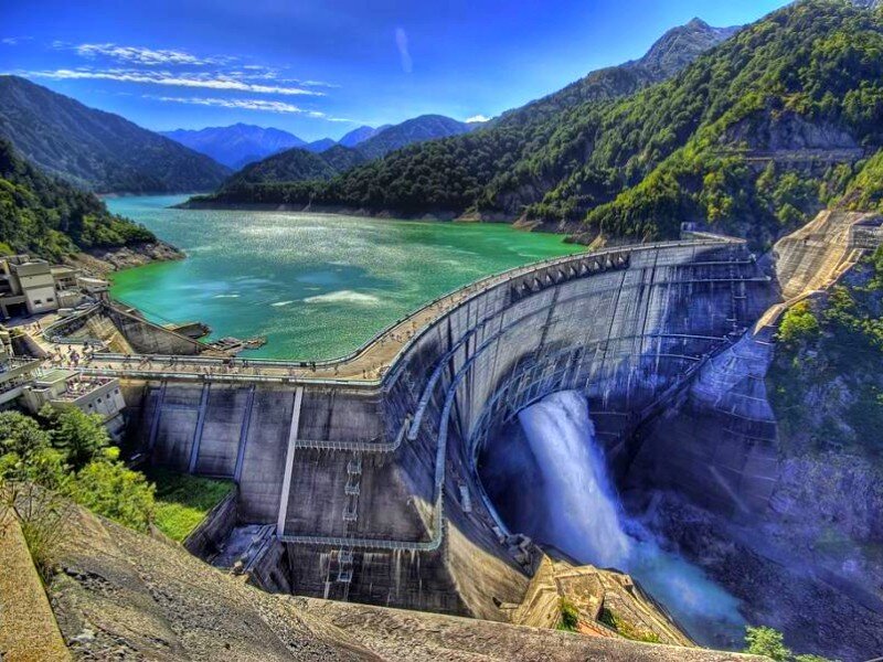 Dam with Water Release — Blue, Dramatic, Afternoon, Photograph, Mountains