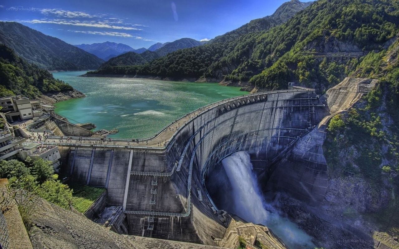 Dam with water release in mountains