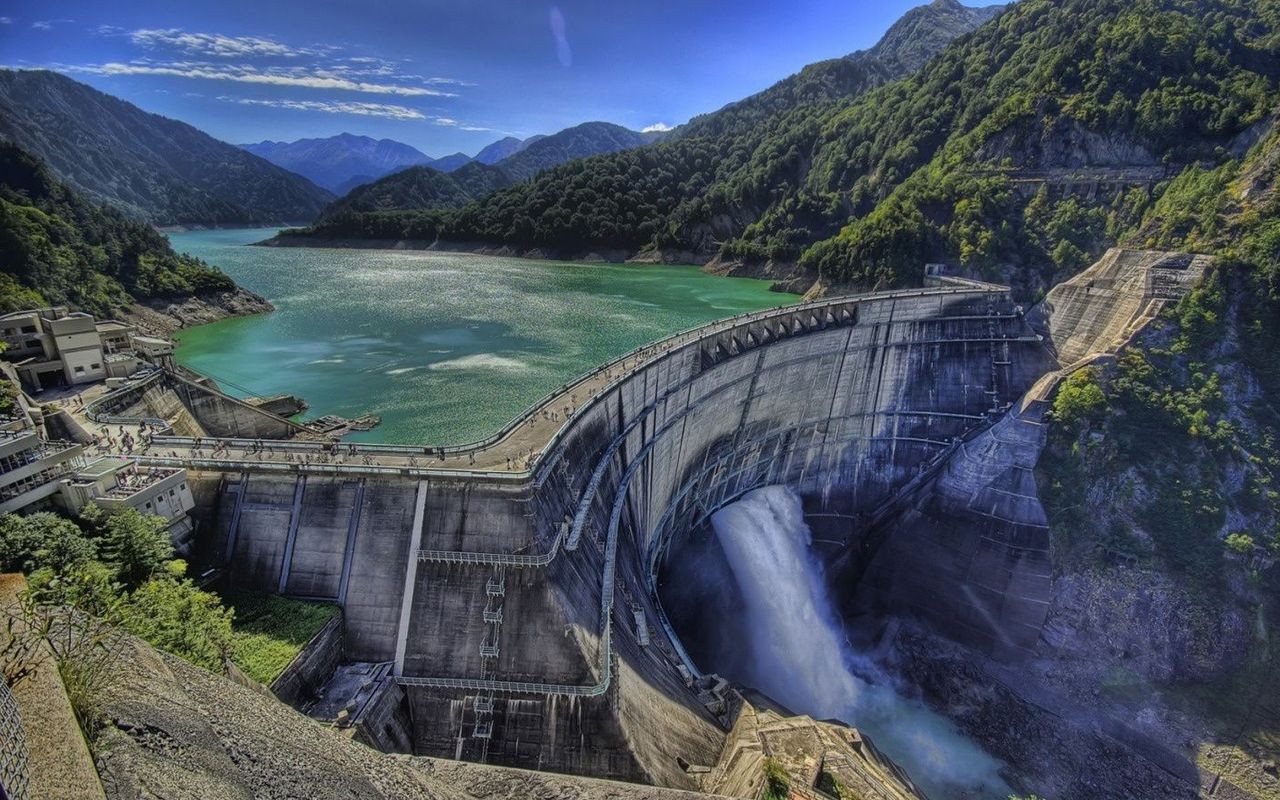 Dam with water release in mountains