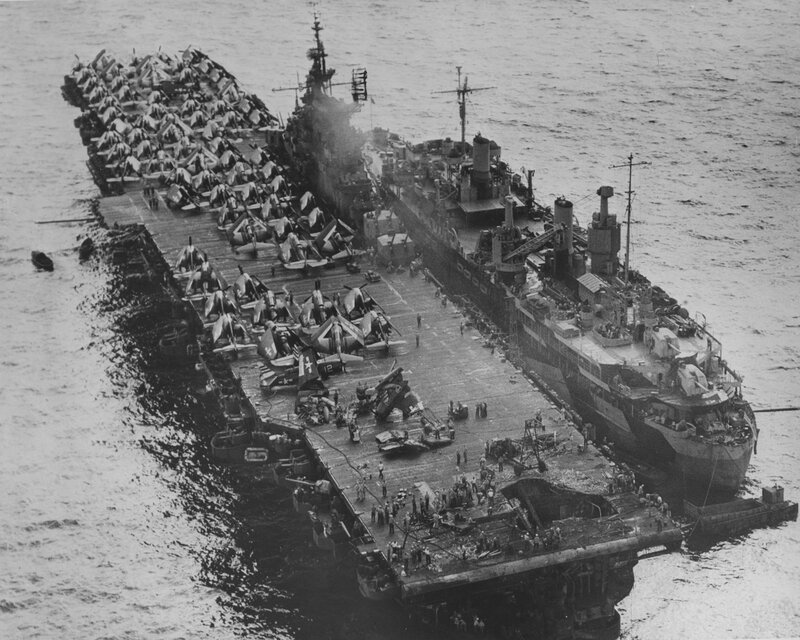 Damaged aircraft carrier at sea