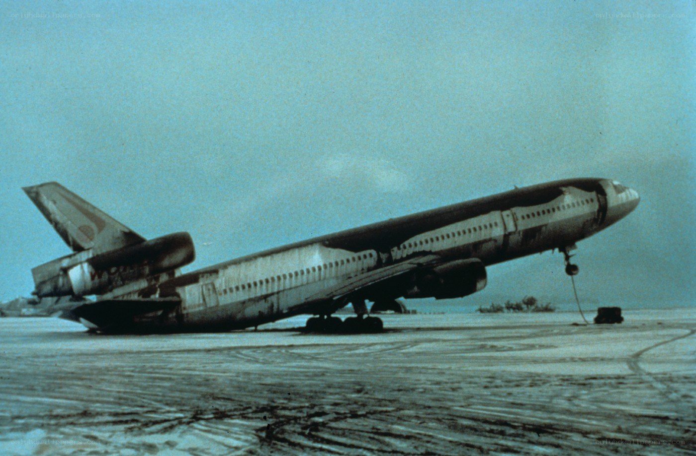 Damaged airplane on tarmac
