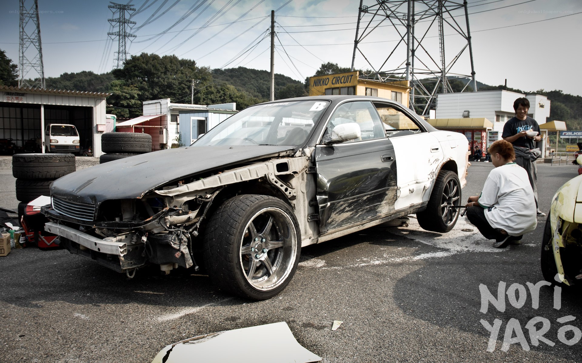 Damaged car at a race track
