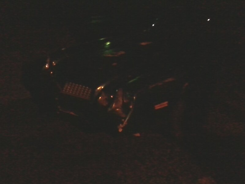 Damaged Car at Night