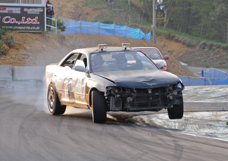 Damaged car drifting on track