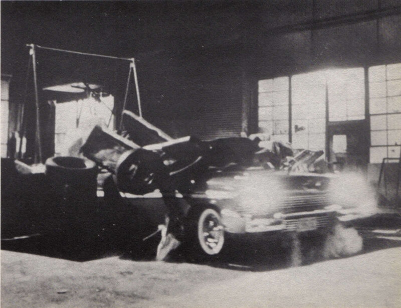 Damaged Car in Garage