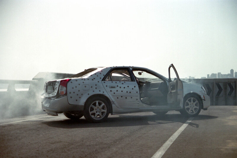damaged car on highway