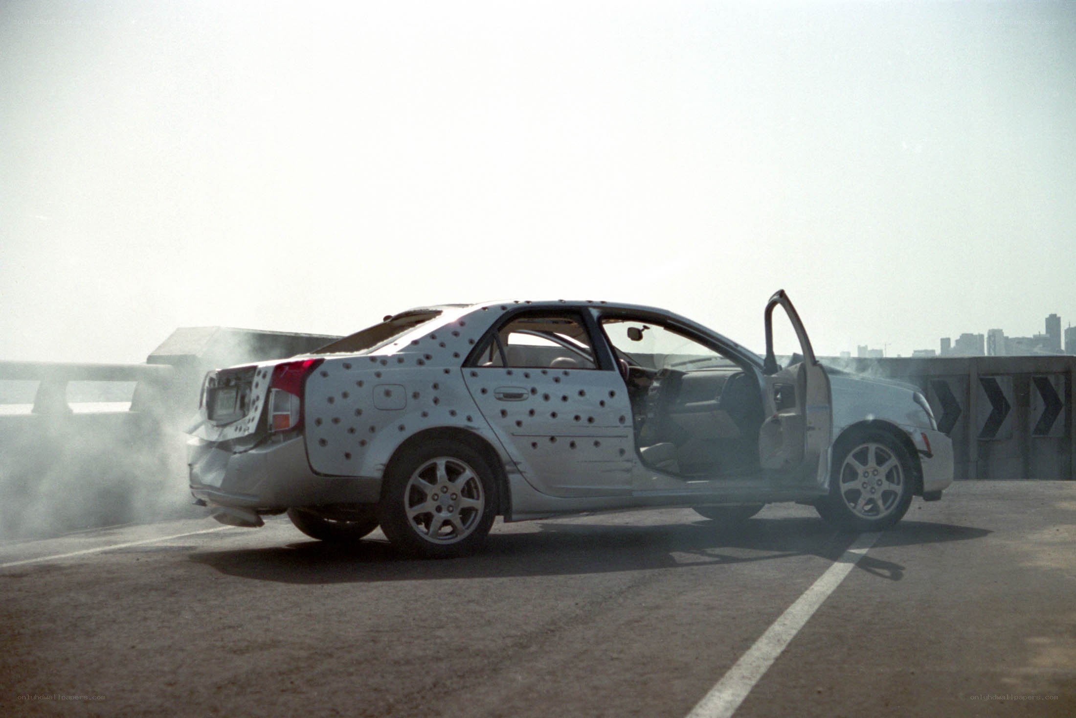 damaged car on highway