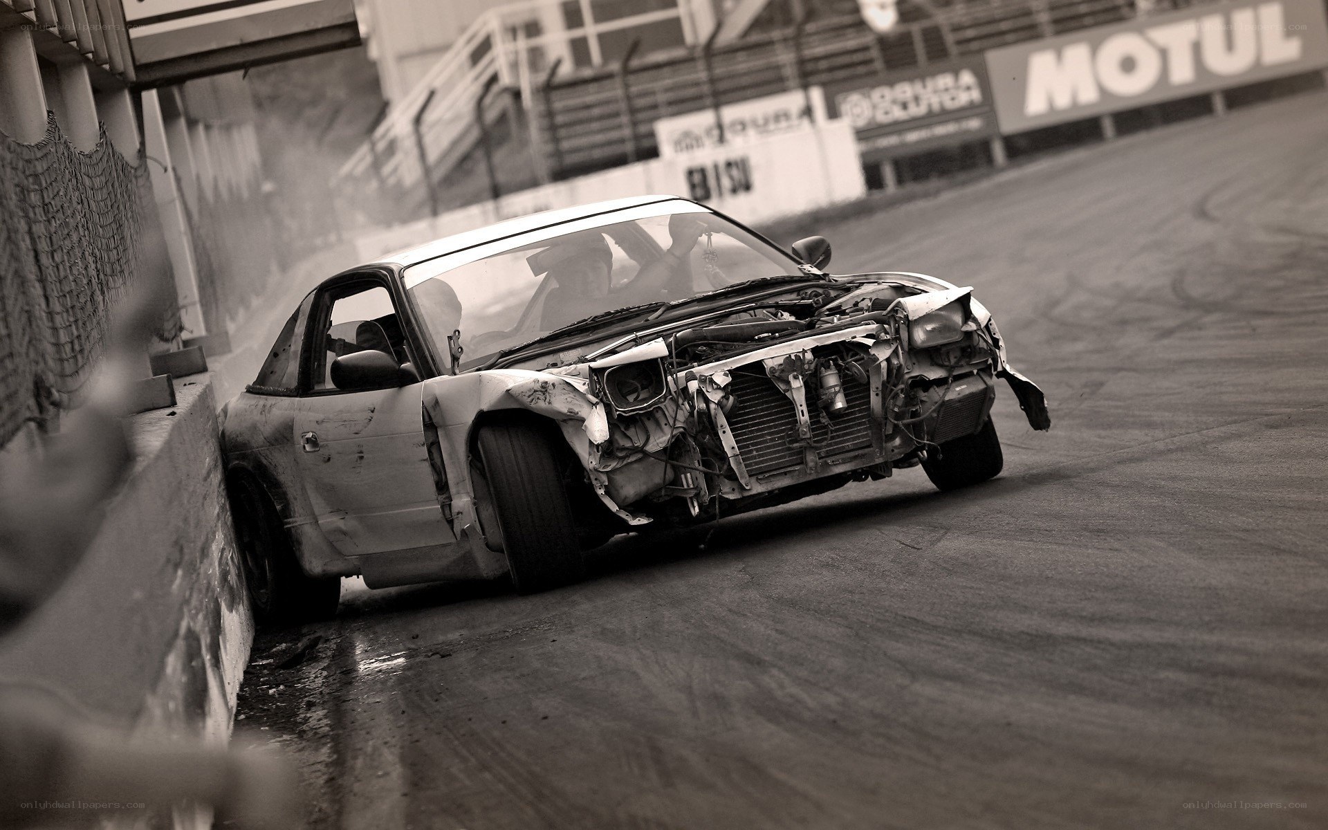 Damaged car on racetrack