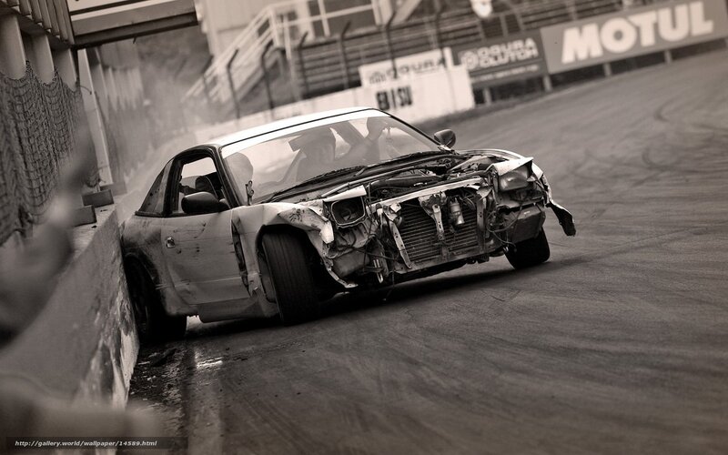 Damaged car on racetrack