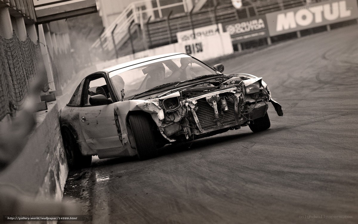 Damaged car on racetrack