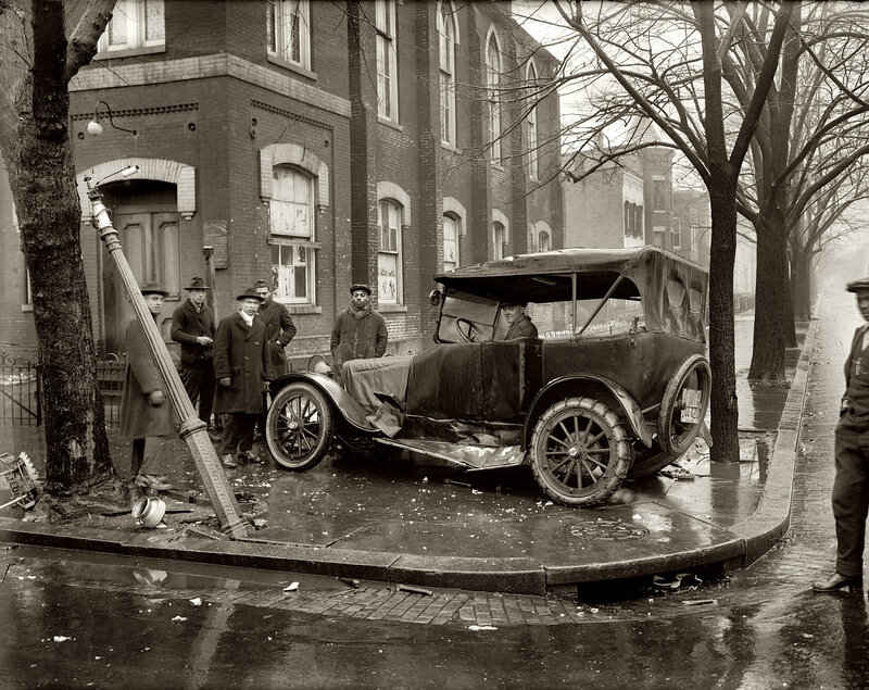Damaged Car on Street