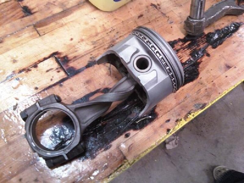 damaged engine piston and rod