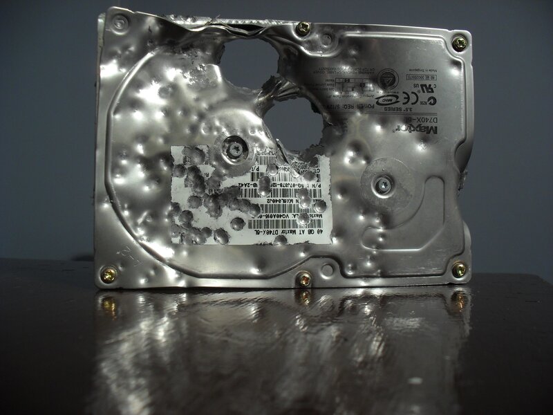 Damaged Hard Drive — Silver