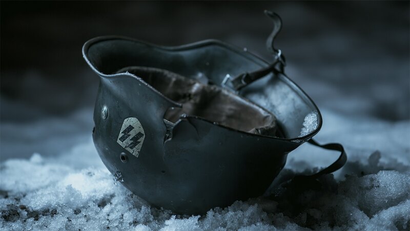 Damaged Helmet in Snow