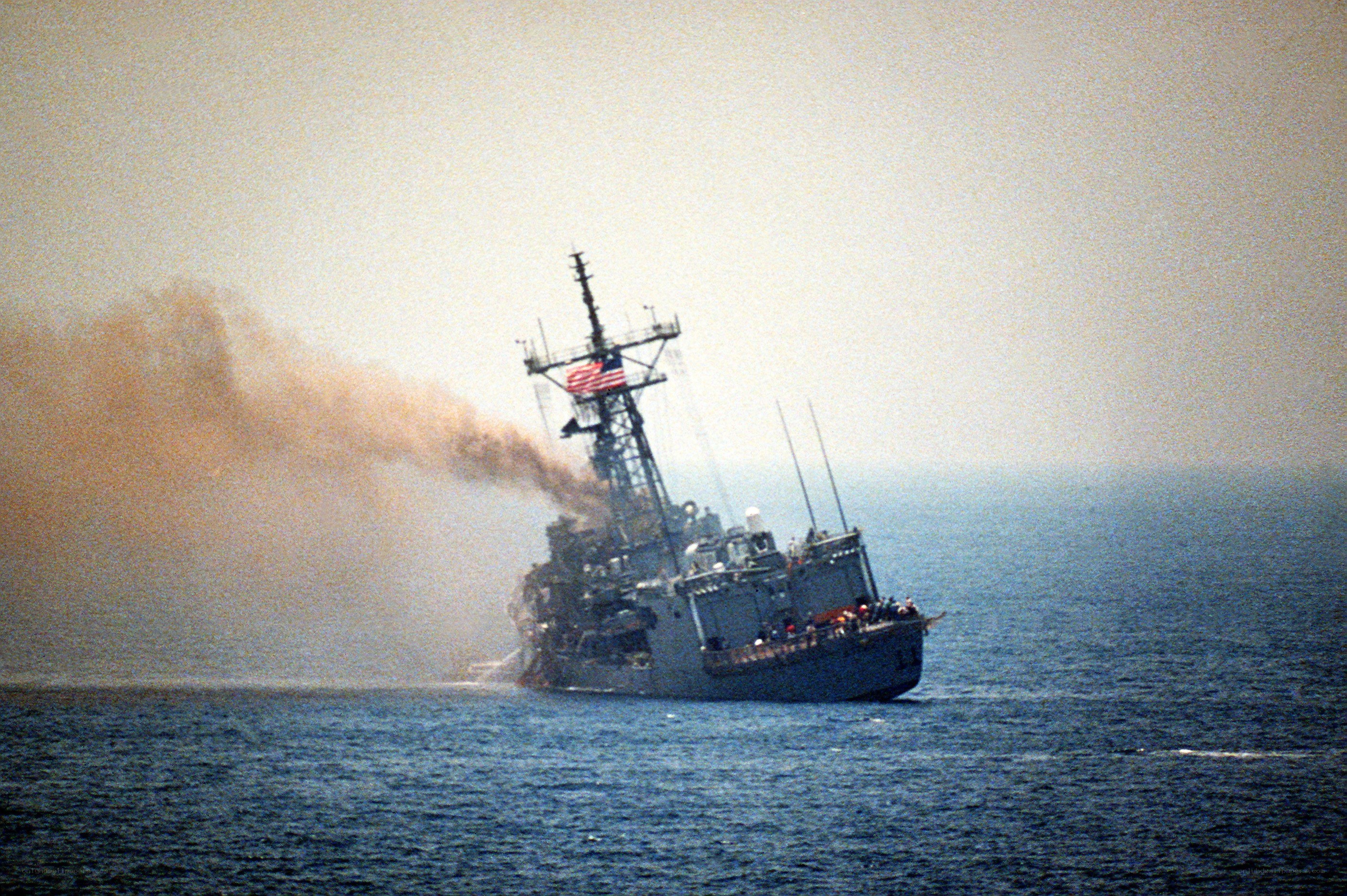 Damaged naval ship in ocean