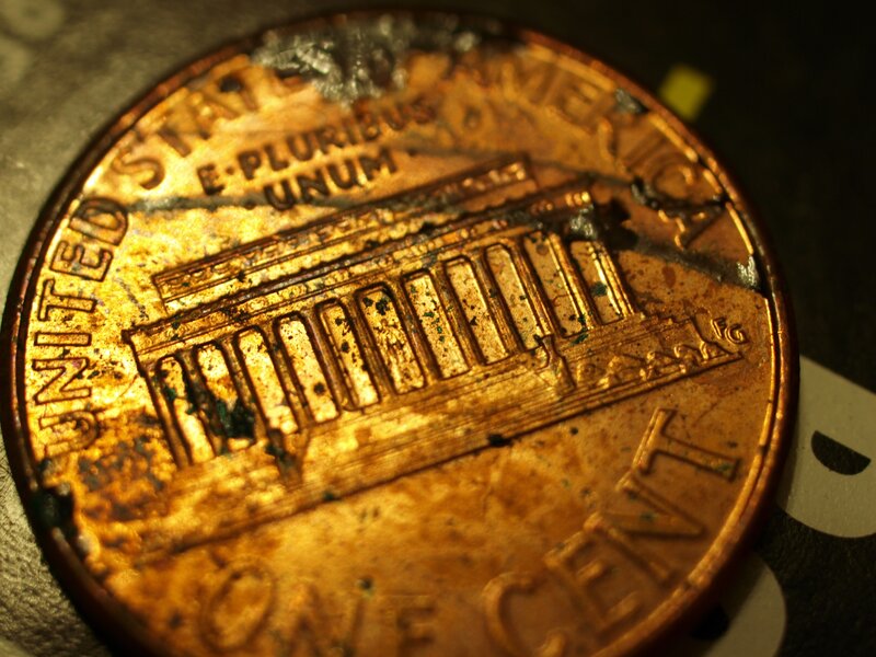 damaged one-cent coin