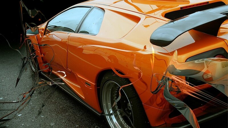 Damaged orange sports car