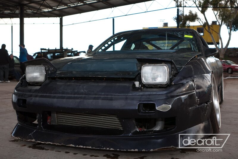 damaged race car at a track