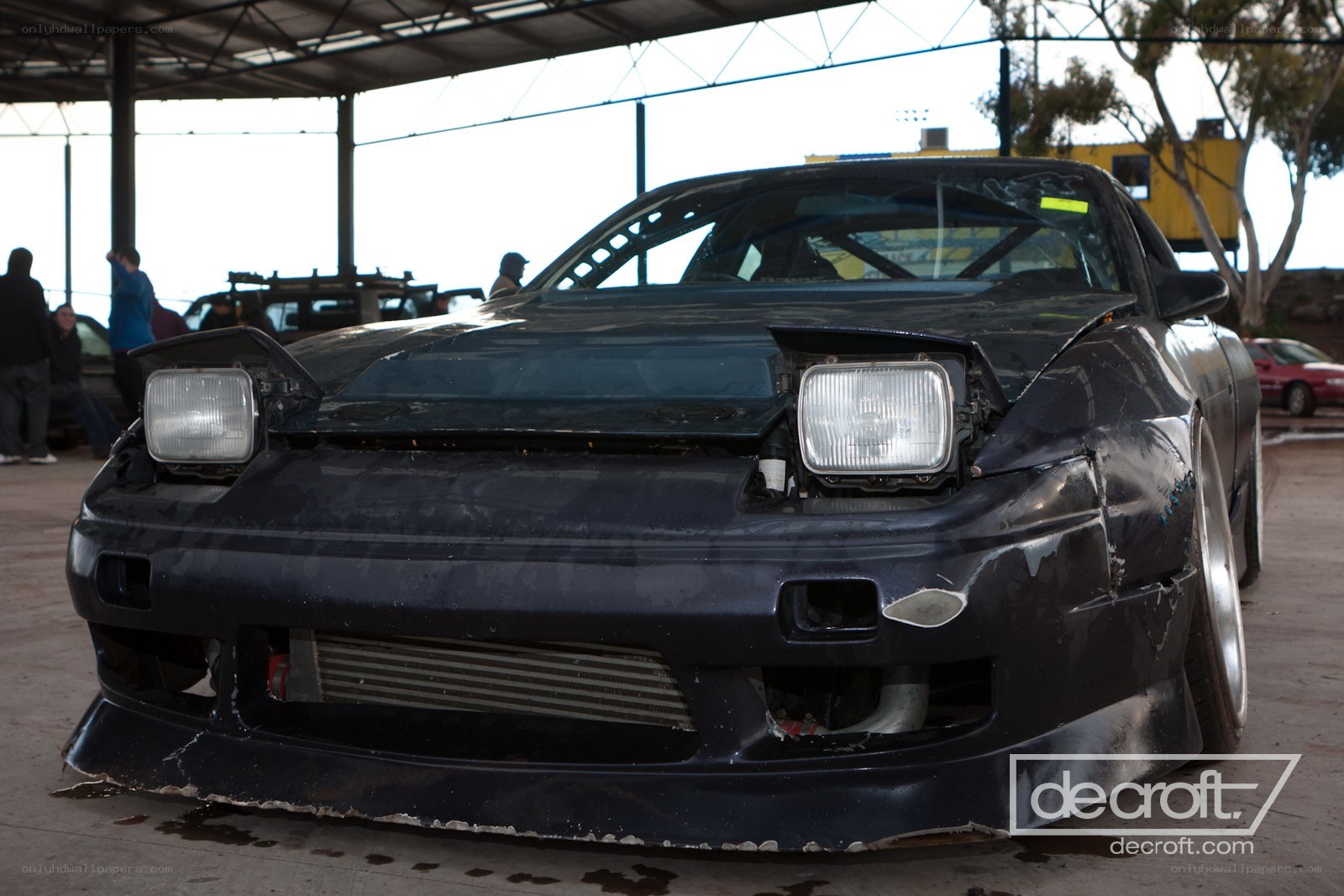 damaged race car at a track
