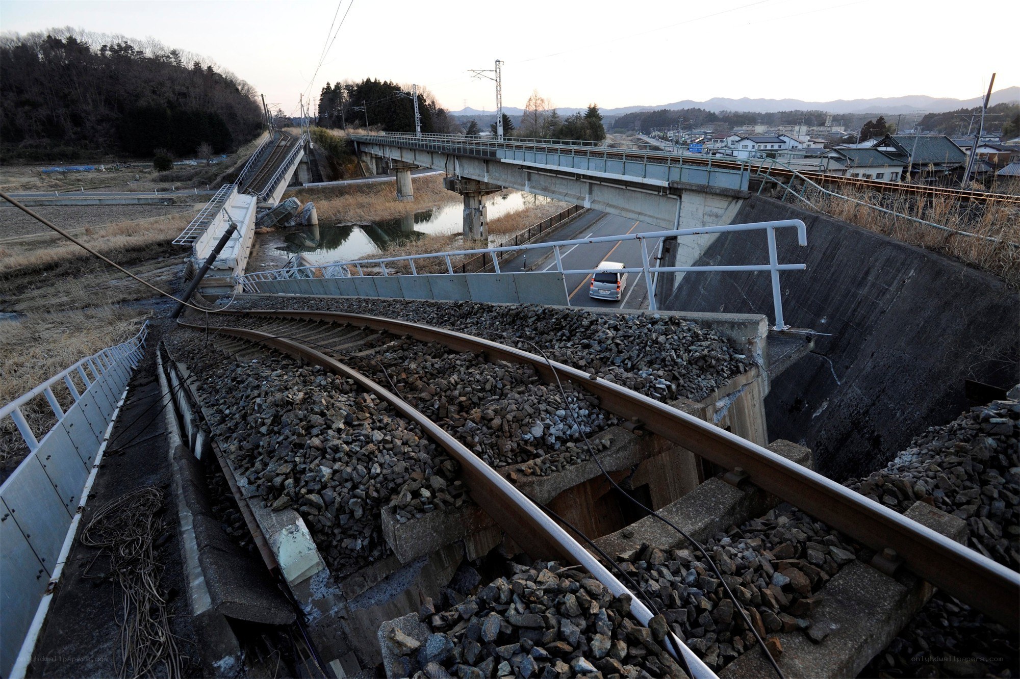Damaged railway bridge over road