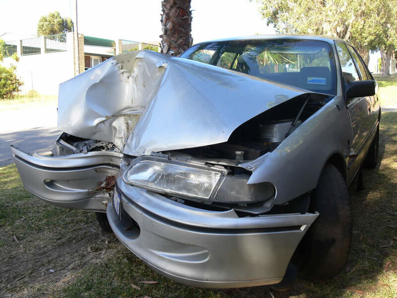 damaged silver car