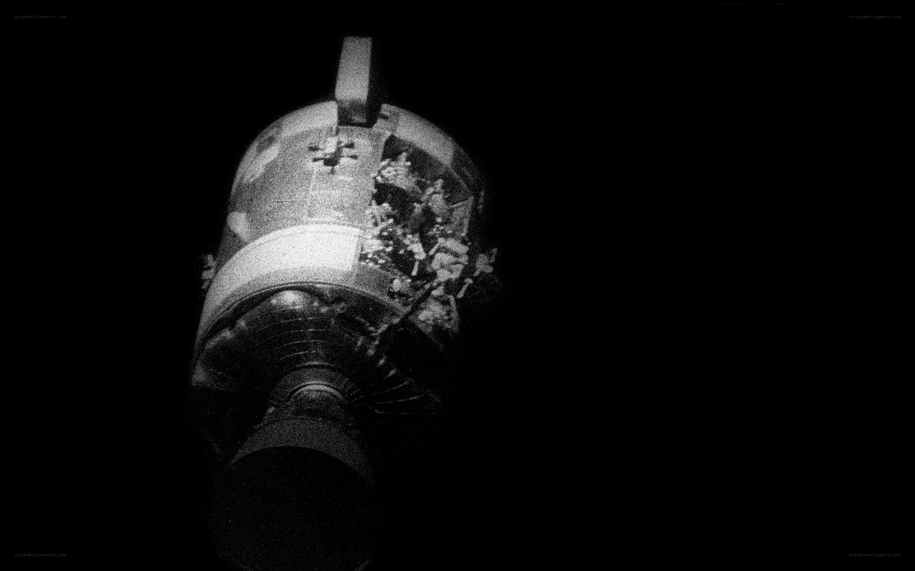damaged spacecraft in space