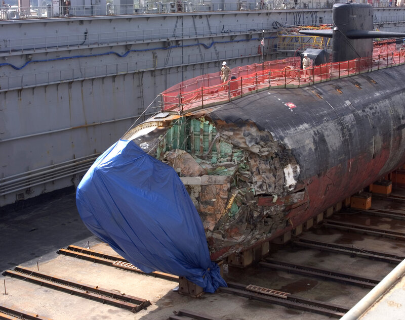 Damaged submarine in dry dock