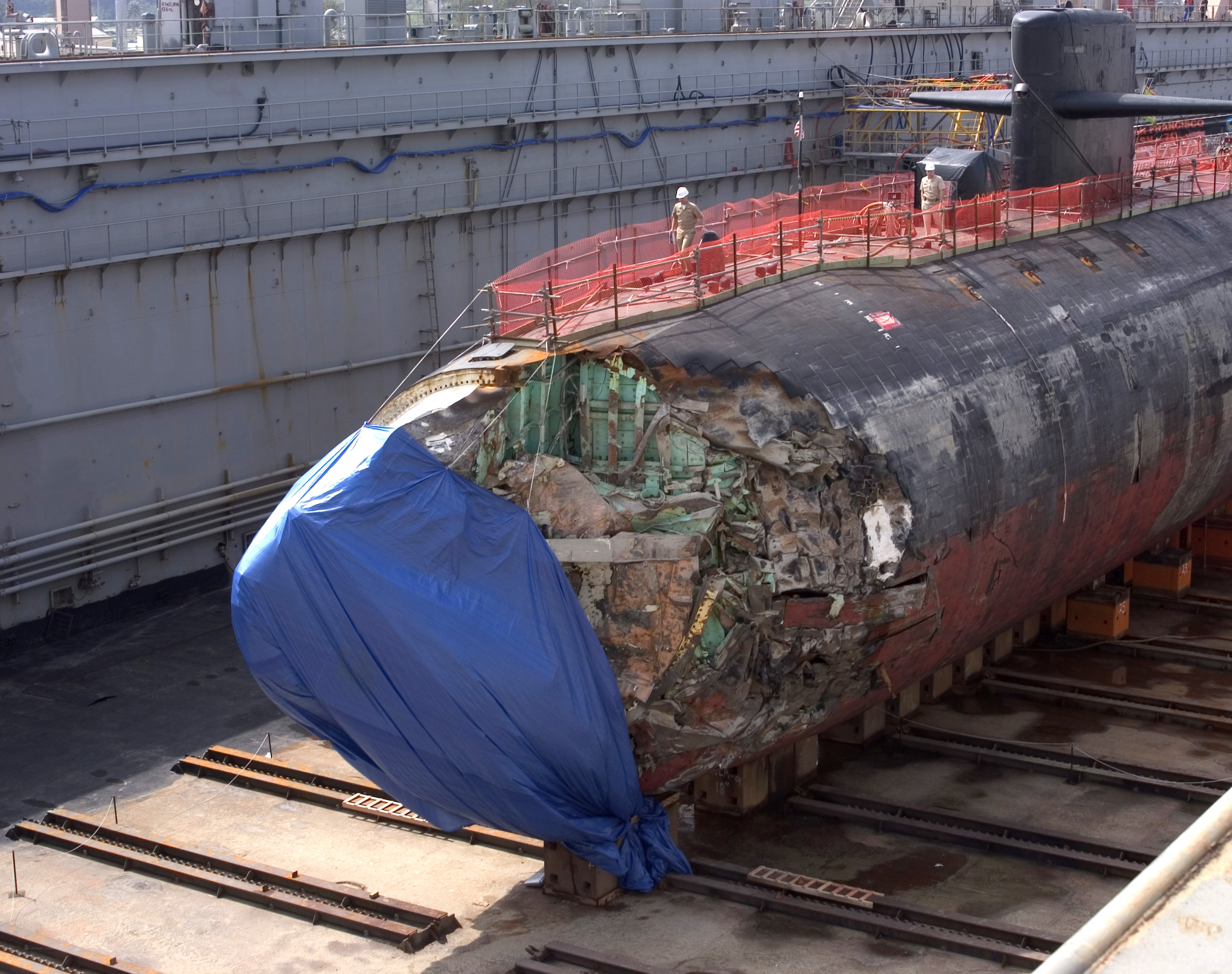 Damaged submarine in dry dock