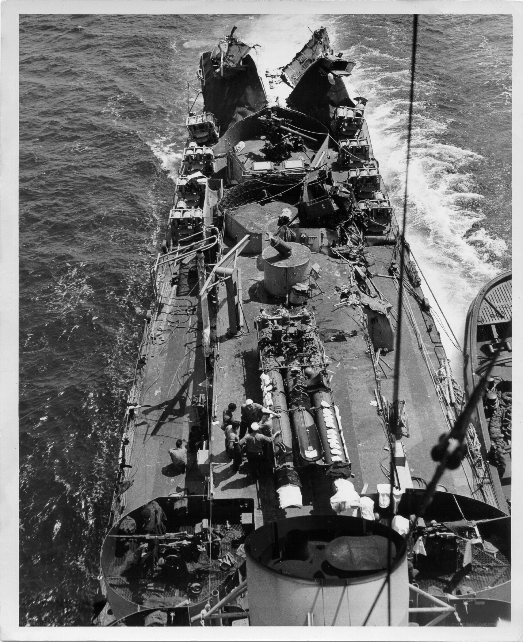 Damaged warship at sea