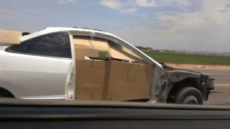 Damaged White Car