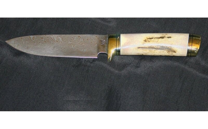 Damascus steel knife with antler handle