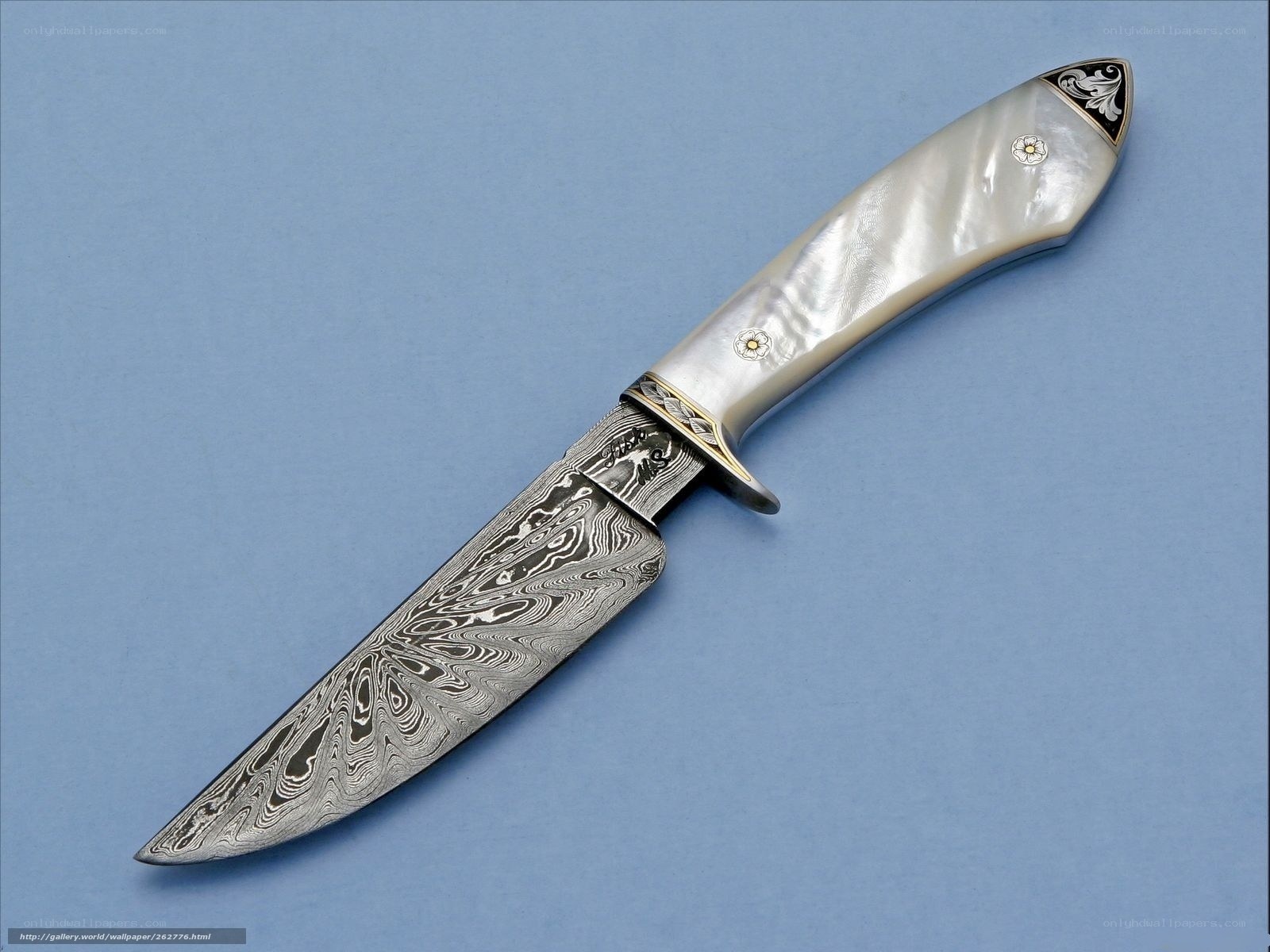 Damascus steel knife with mother-of-pearl handle