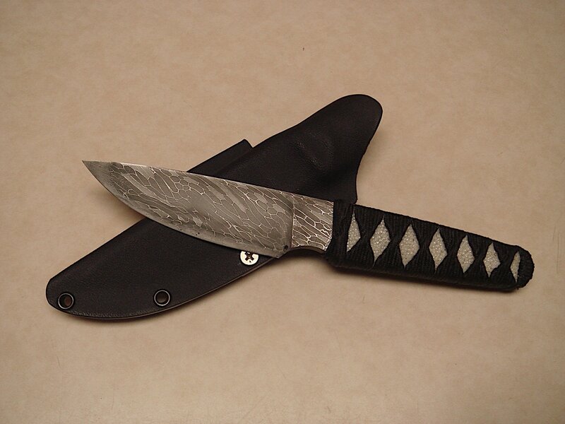 Damascus steel knife with sheath