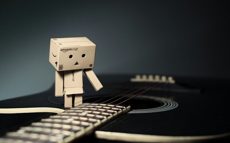Danbo Figure on Guitar