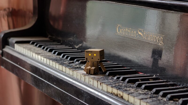Danbo Figure on Piano — Black