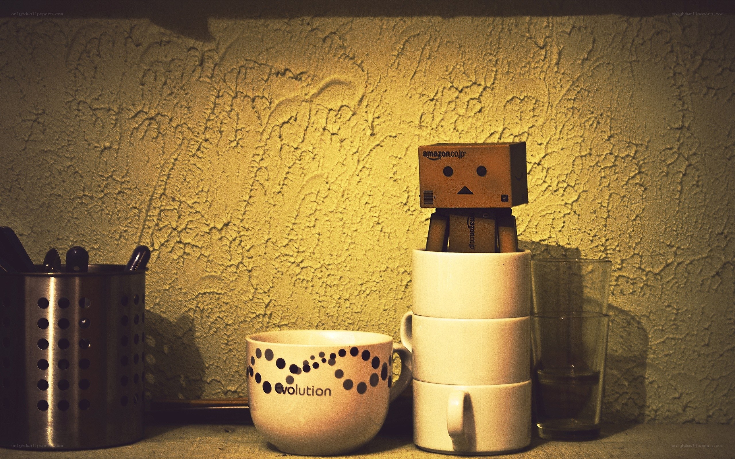 Danbo figure on stacked mugs