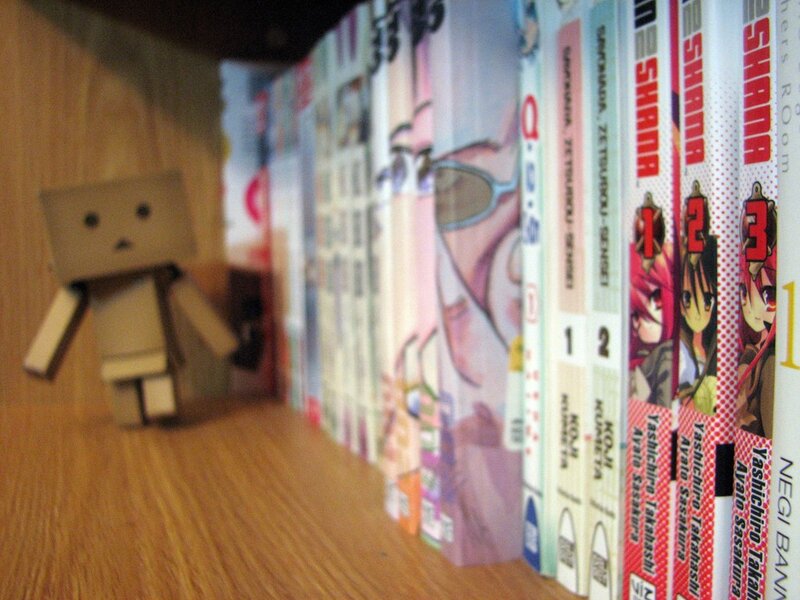 Danbo figure with manga books