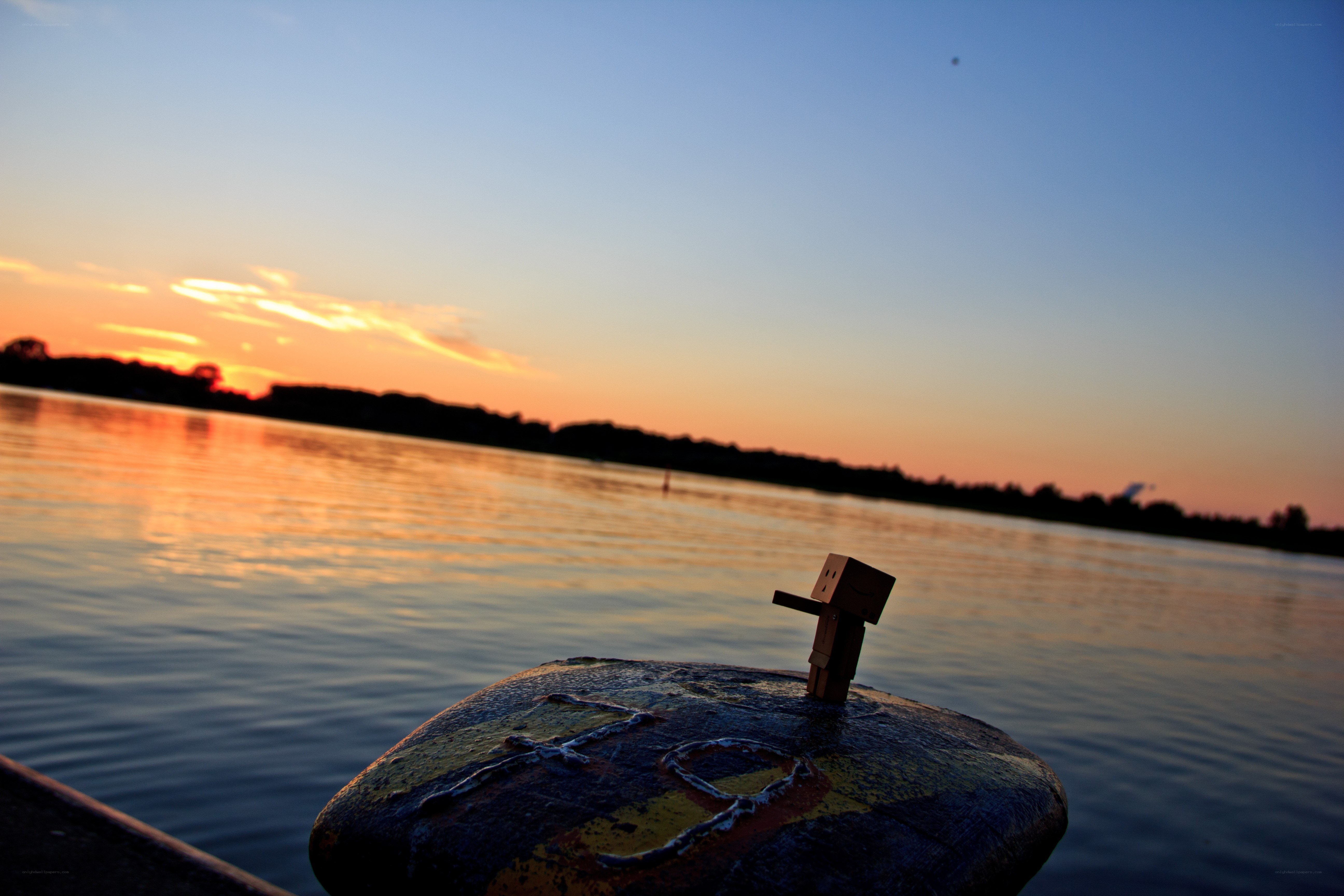 Danbo on a bollard at sunset