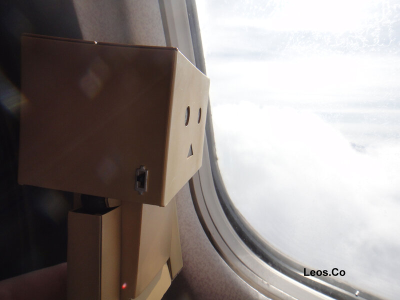 Danbo Robot at Airplane Window