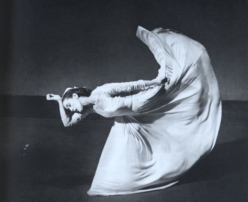 Dancer in a swirling white dress
