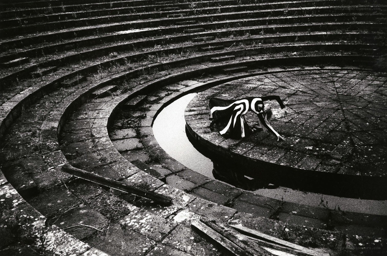 Dancer in an ancient amphitheater