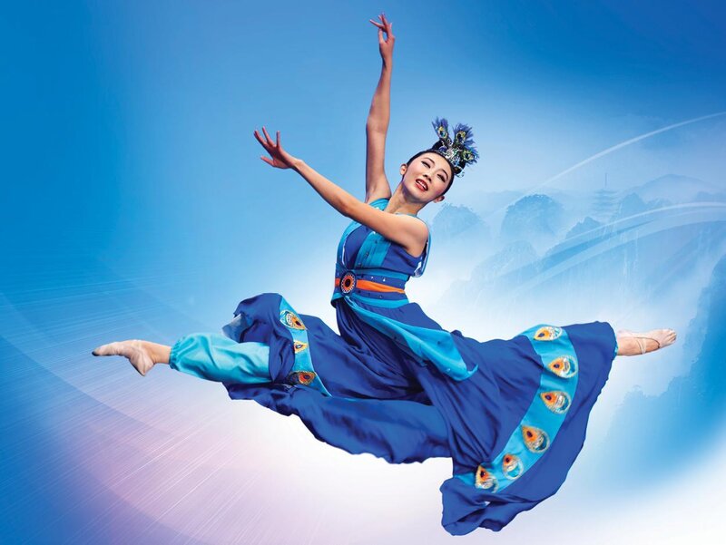 dancer in blue costume