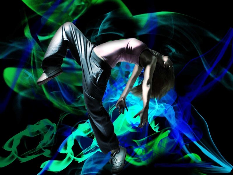 Dancer in colorful smoke
