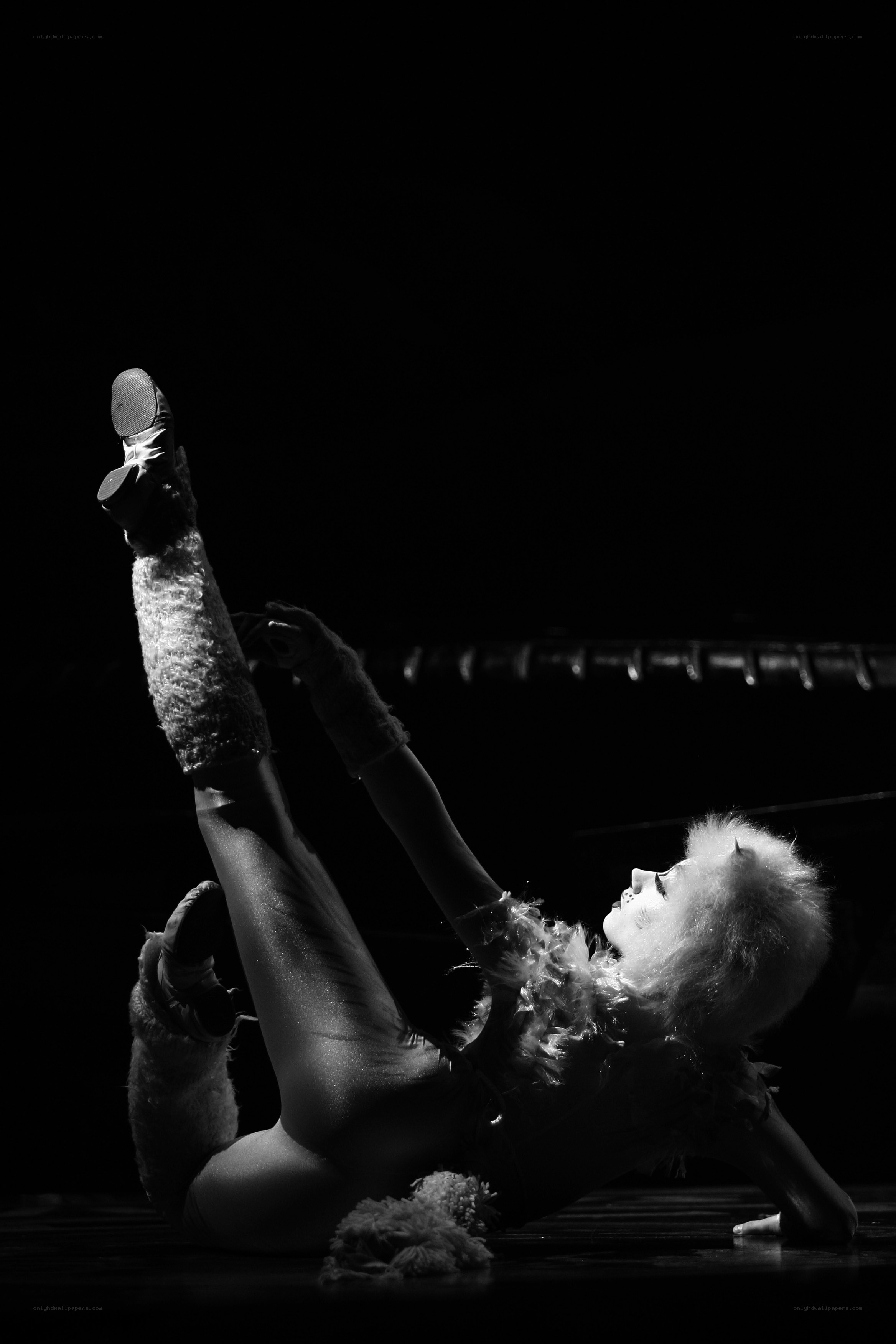 Dancer in costume on stage