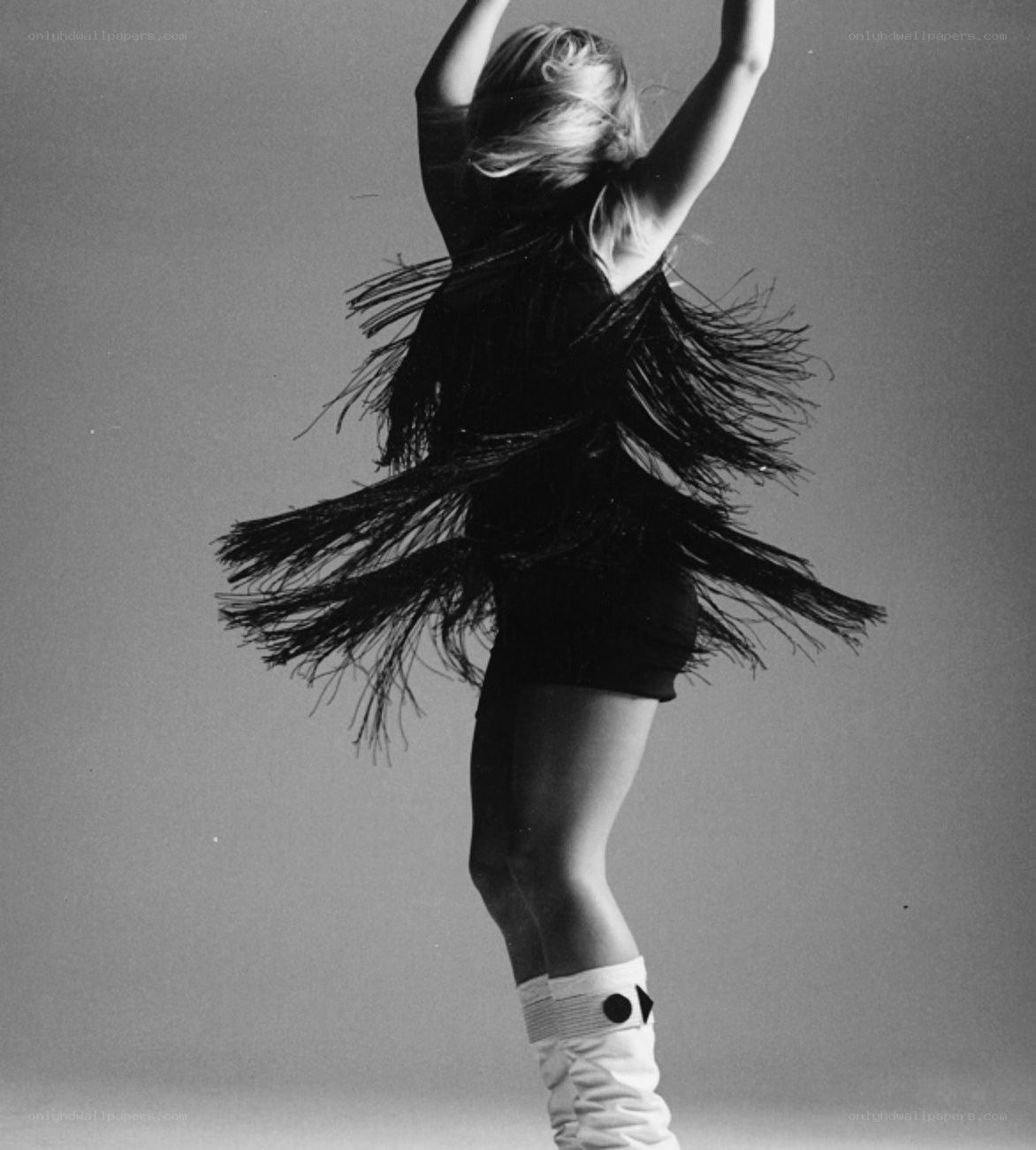 dancer in fringed costume