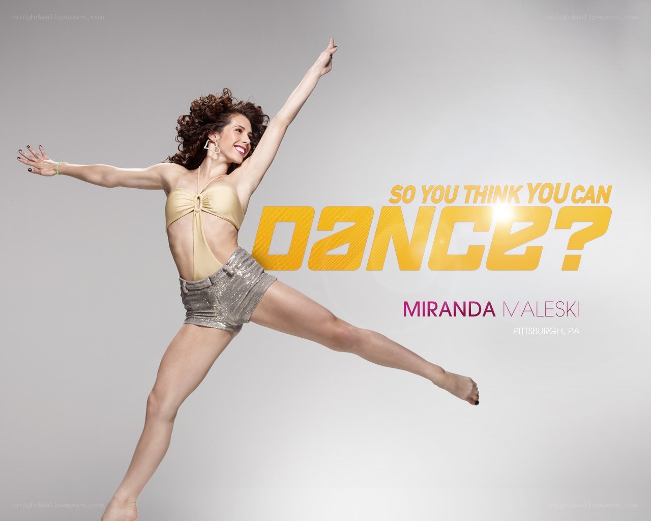 Dancer in gold outfit