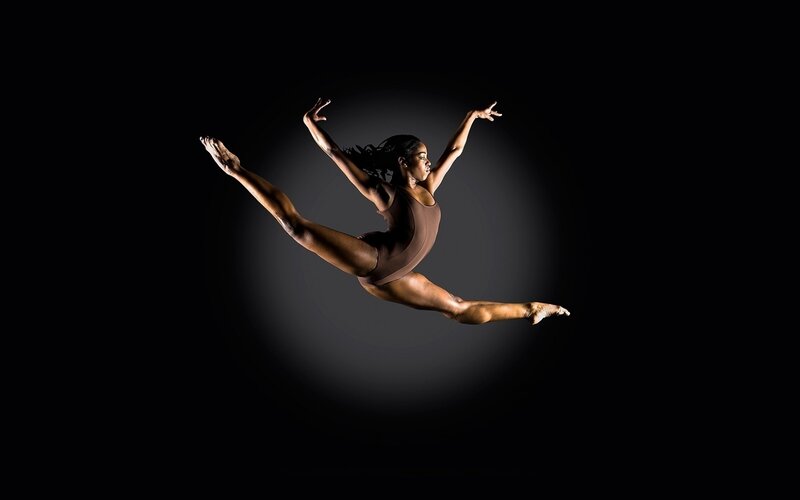 dancer in mid-air leap