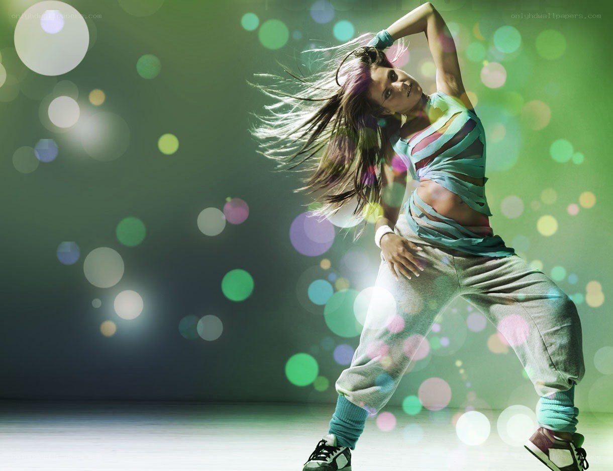 Dancer in motion with colorful lights
