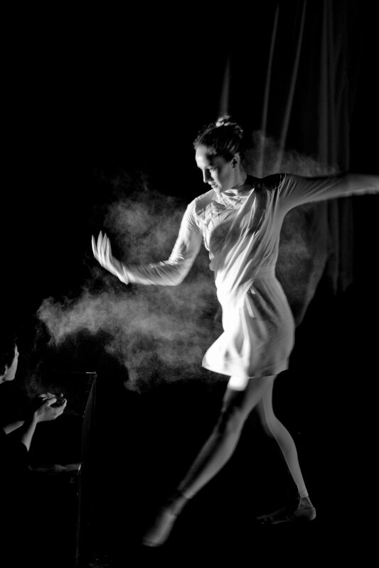 Dancer in motion with smoke