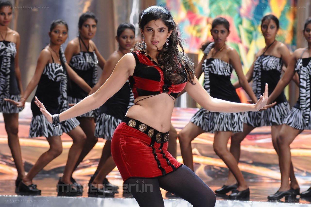 dancer in red and black outfit